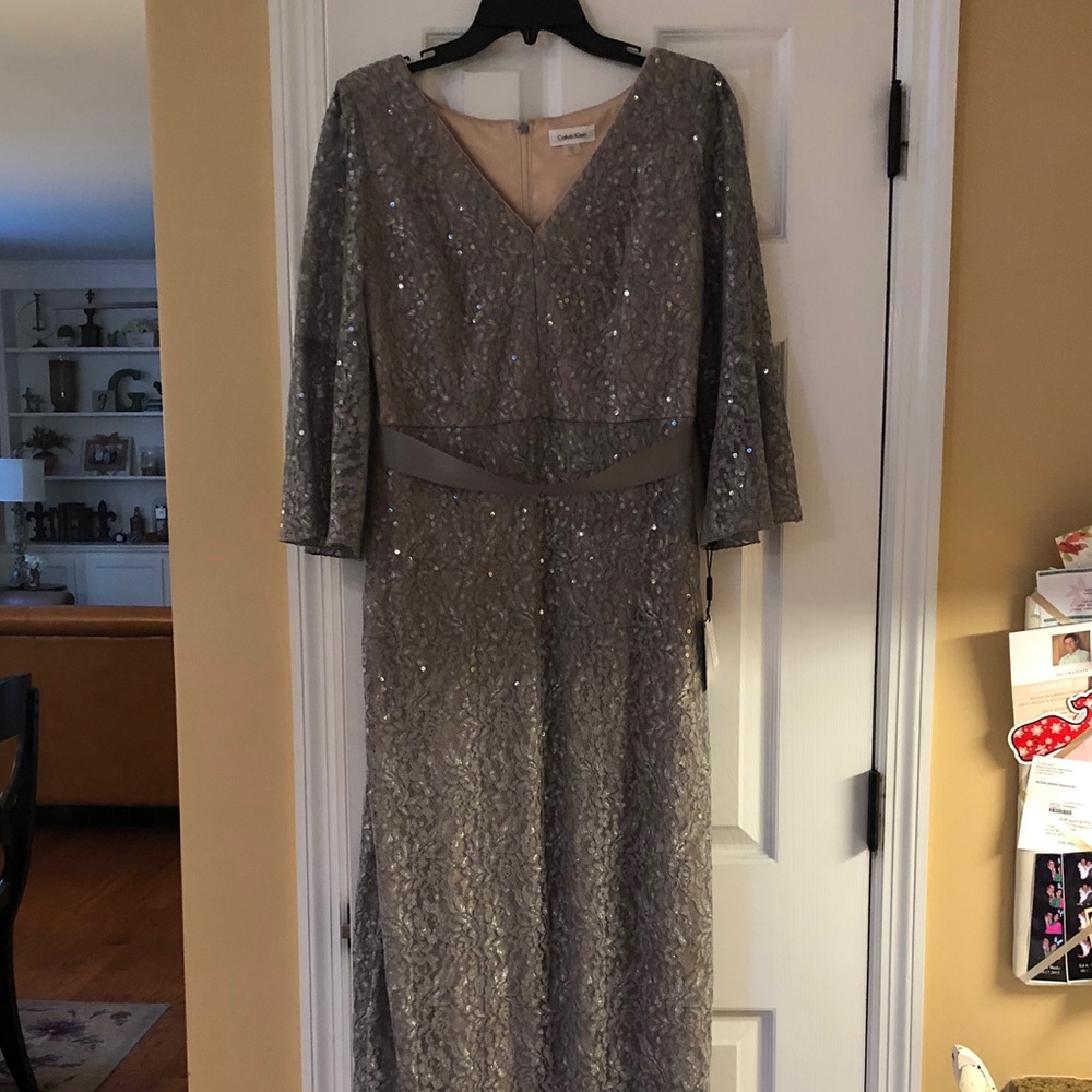 Brand new Calvin Klein evening gown with t…
